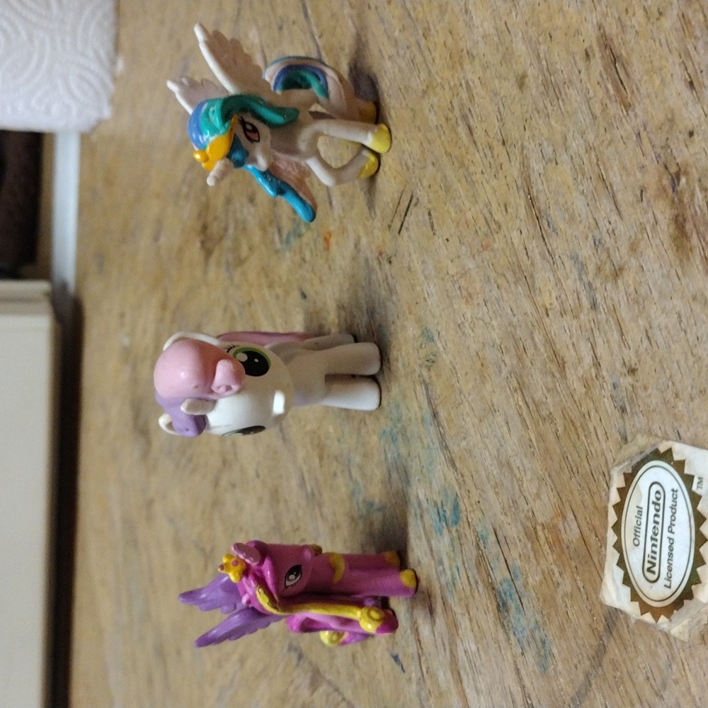 Sweetie Belle, Princess Celestia, and Princess Cadence mini figurines